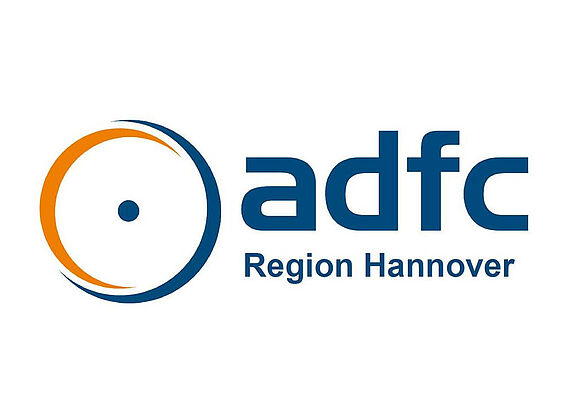 Logo in Form eines Fahrradreifens mit Schriftzug adfc Region Hannover
